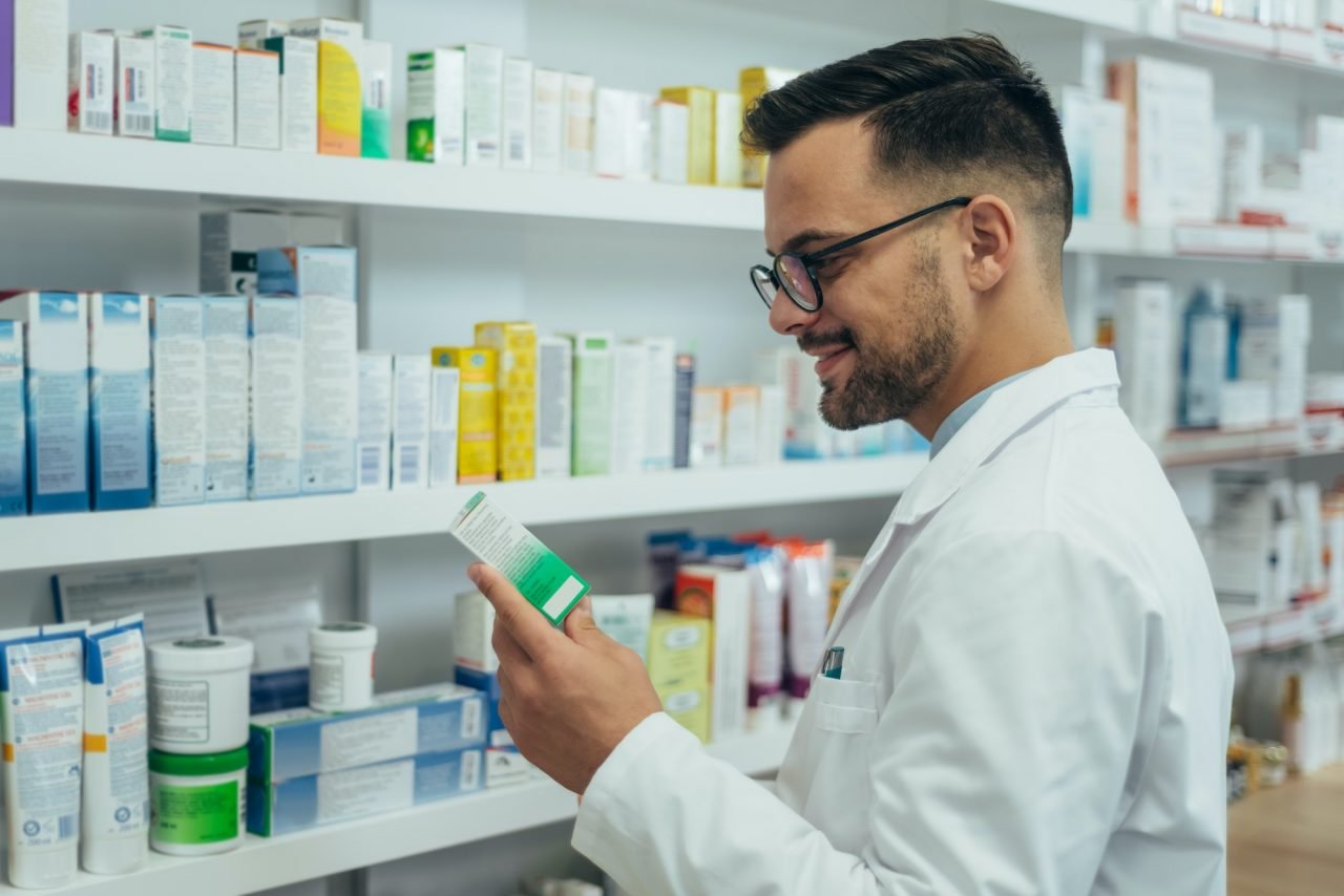 handsome-pharmacist-working-in-a-pharmacy.jpg